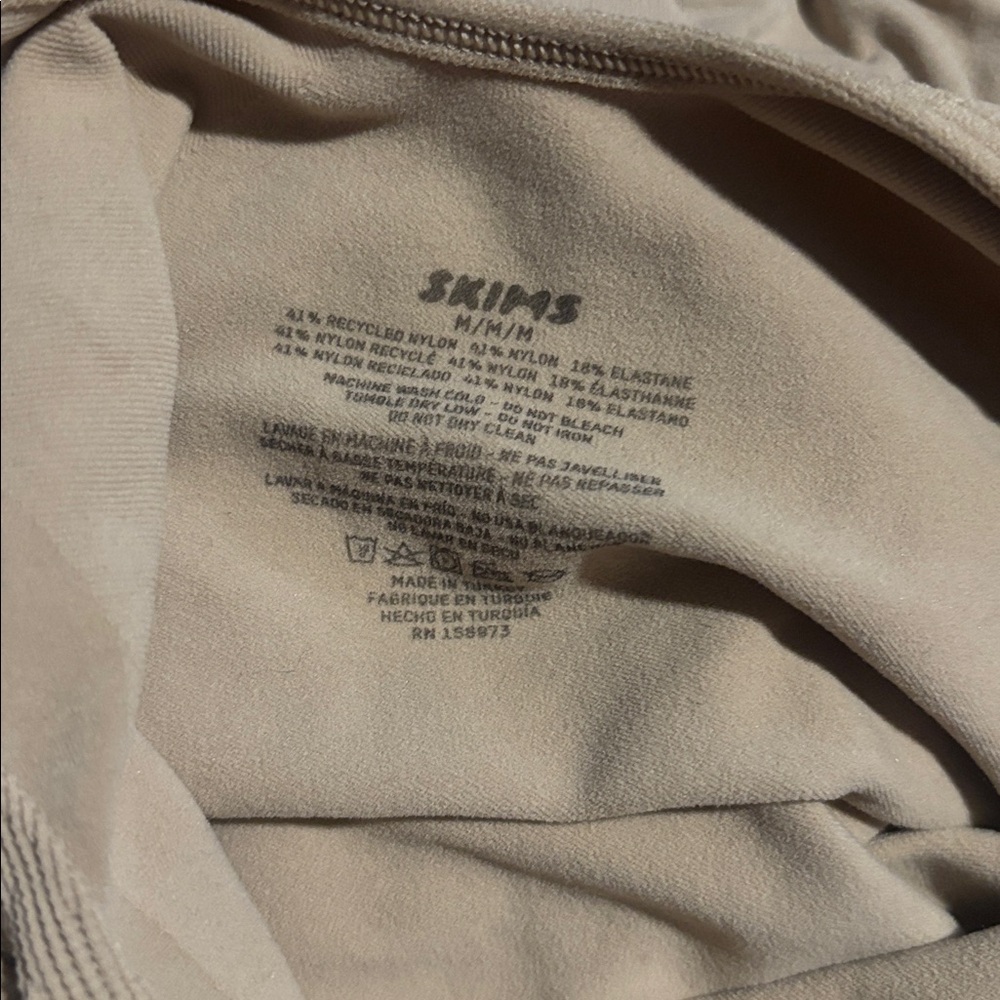 SKIMS Seamless Mid-Thigh Bodysuit in Warm Tan - Picture 8 of 8